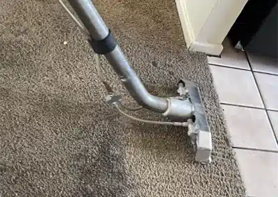 Cleaning a grey carpet that is super dirty.